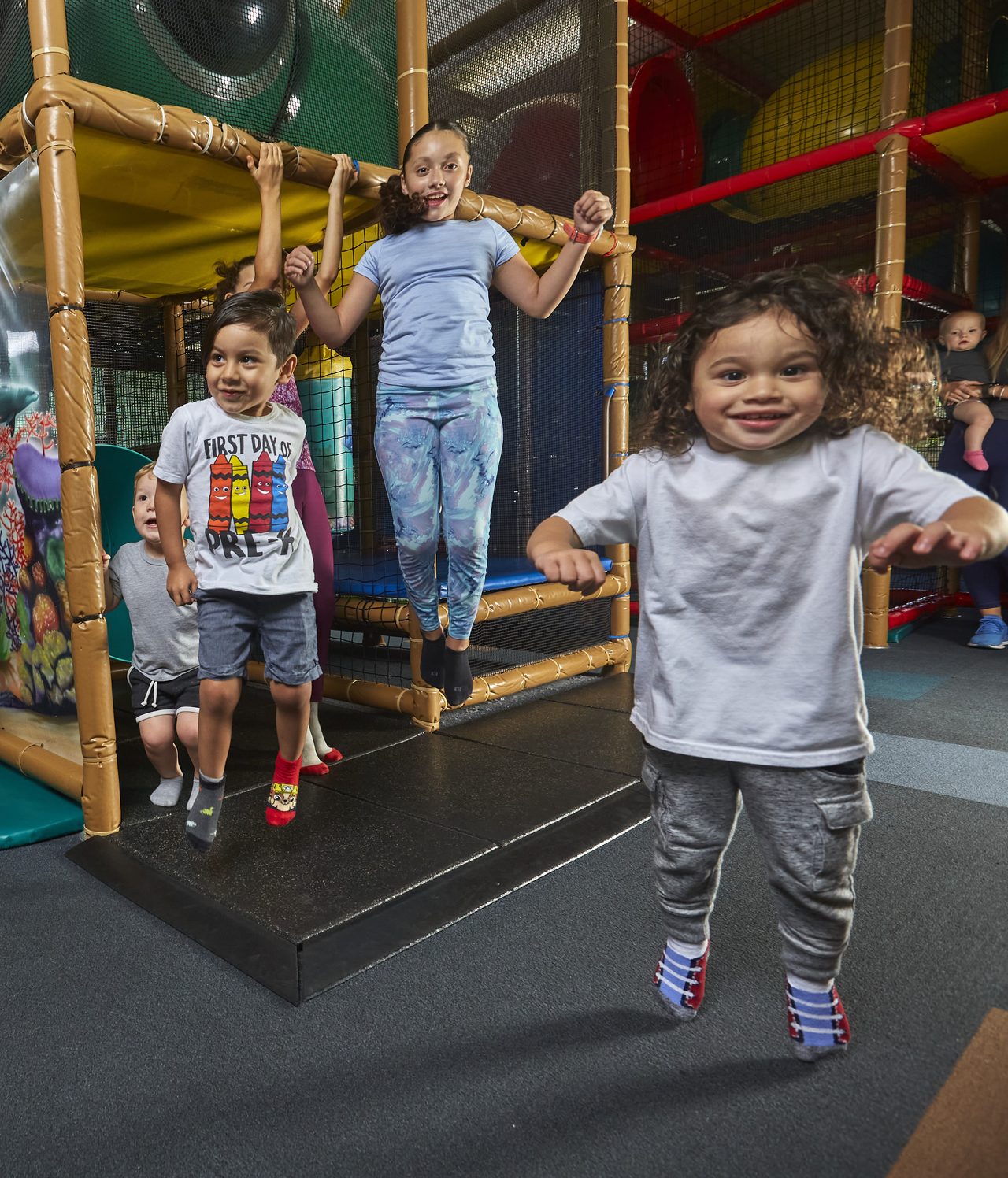 Children playing in the Kid's Club play area